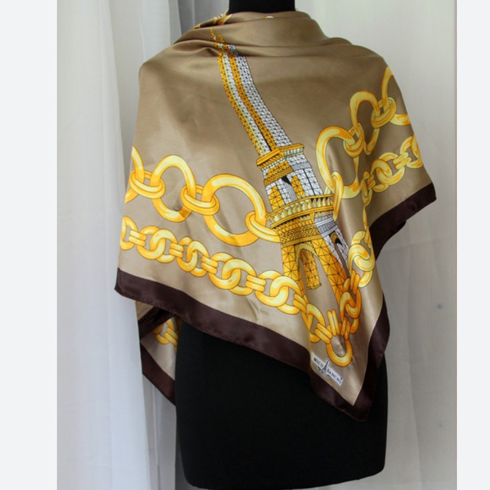 J Mico Sancho scarf, colors are brown, gold and black.
